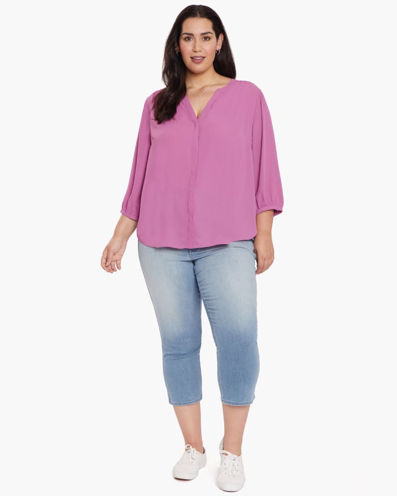 Front of a model wearing a size 0X Pintuck Blouse in Magenta by NYDJ. | dia_product_style_image_id:166460